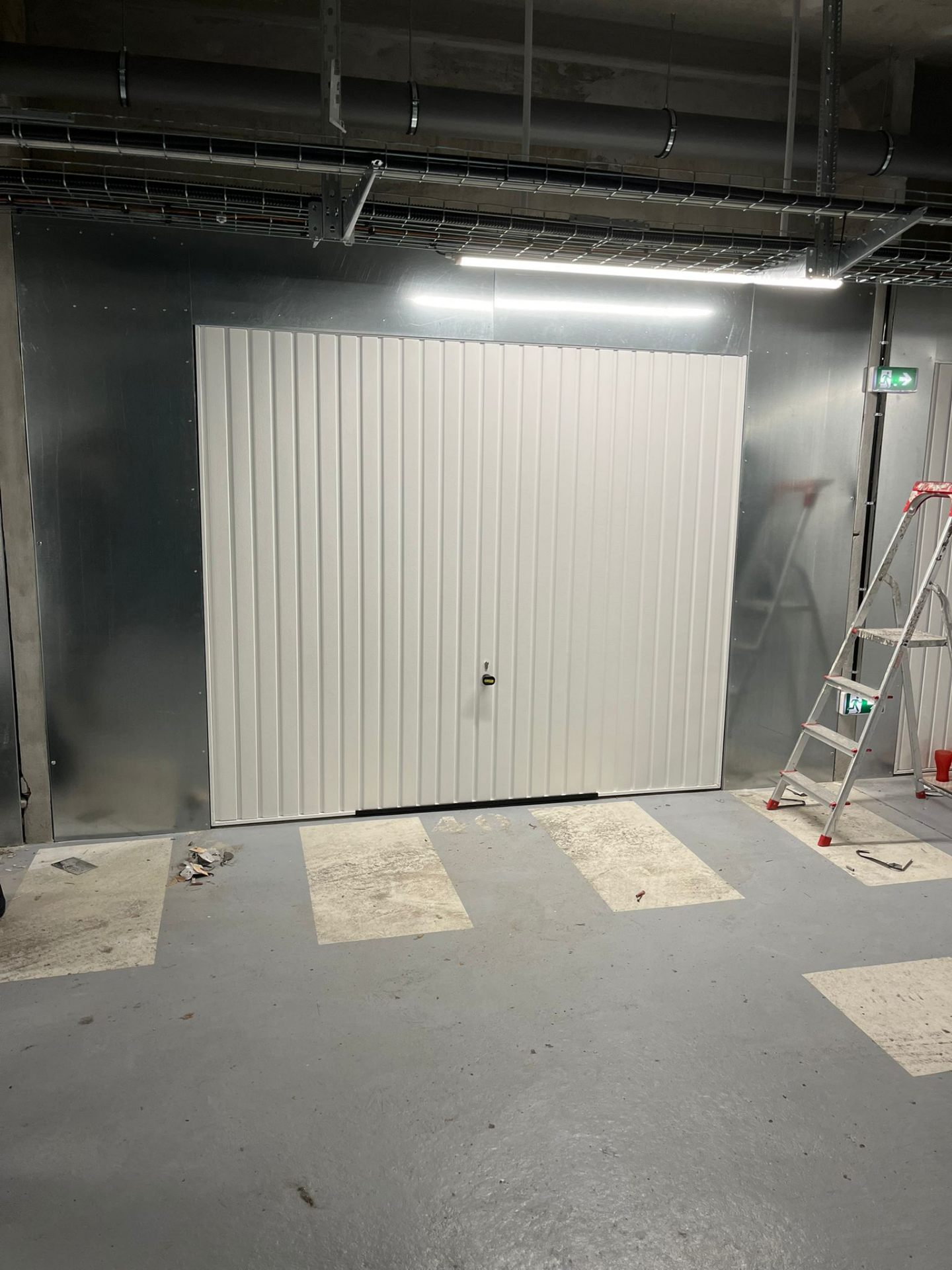 Création d’une porte de garage — Courbevoie